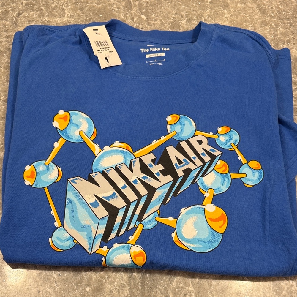 Nike Blue Short Sleeve Graphic Tee with Yellow & Light Blue Accents